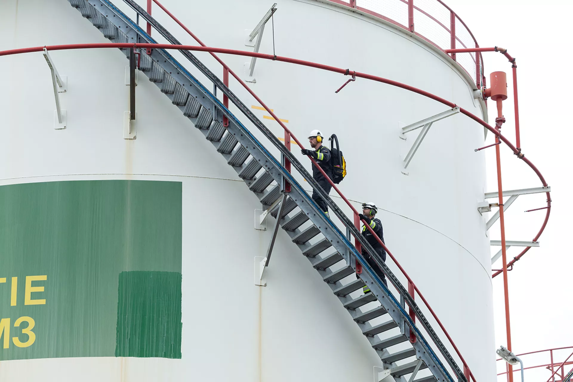 ENV - Intero - The Sniffers engineers walking up storage tank